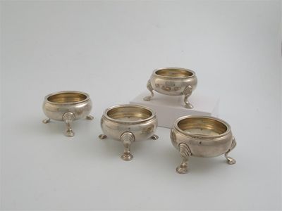 Appraisal: A set of four George II squat circular salts on