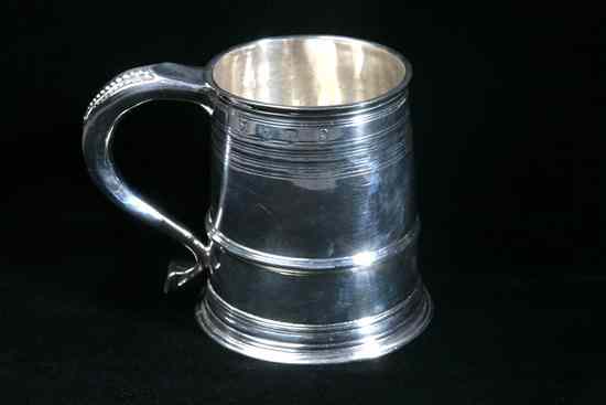 Appraisal: WILLIAM III SILVER TANKARD Isaac Dighton London Tapering cylindrical the