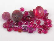 Appraisal: A quantity of loose polished rubies mixed cuts and sizes