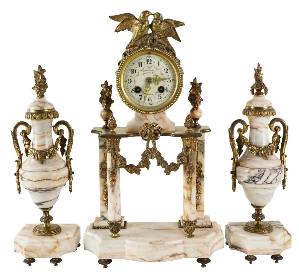 Appraisal: FRENCH MARBLE GILT METAL CLOCK GARNITUREthe clock signed to dial