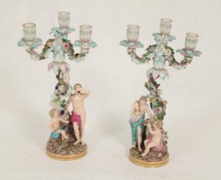 Appraisal: PAIR OF LIGHT MEISSEN PORCELAIN CANDELABRA HAVING PARTIALLY DRAPED FIGURES