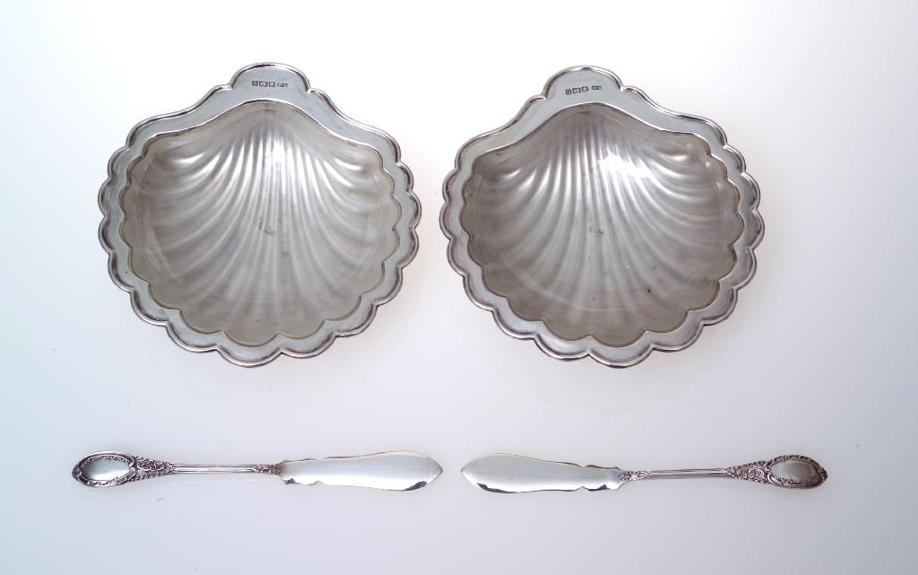 Appraisal: PAIR OF GEORGE V SILVER BUTTER DISHES AND KNIVES CASED