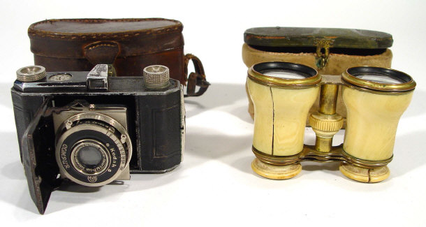 Appraisal: Pair of ivory handled opera glasses and a Kodak Compur