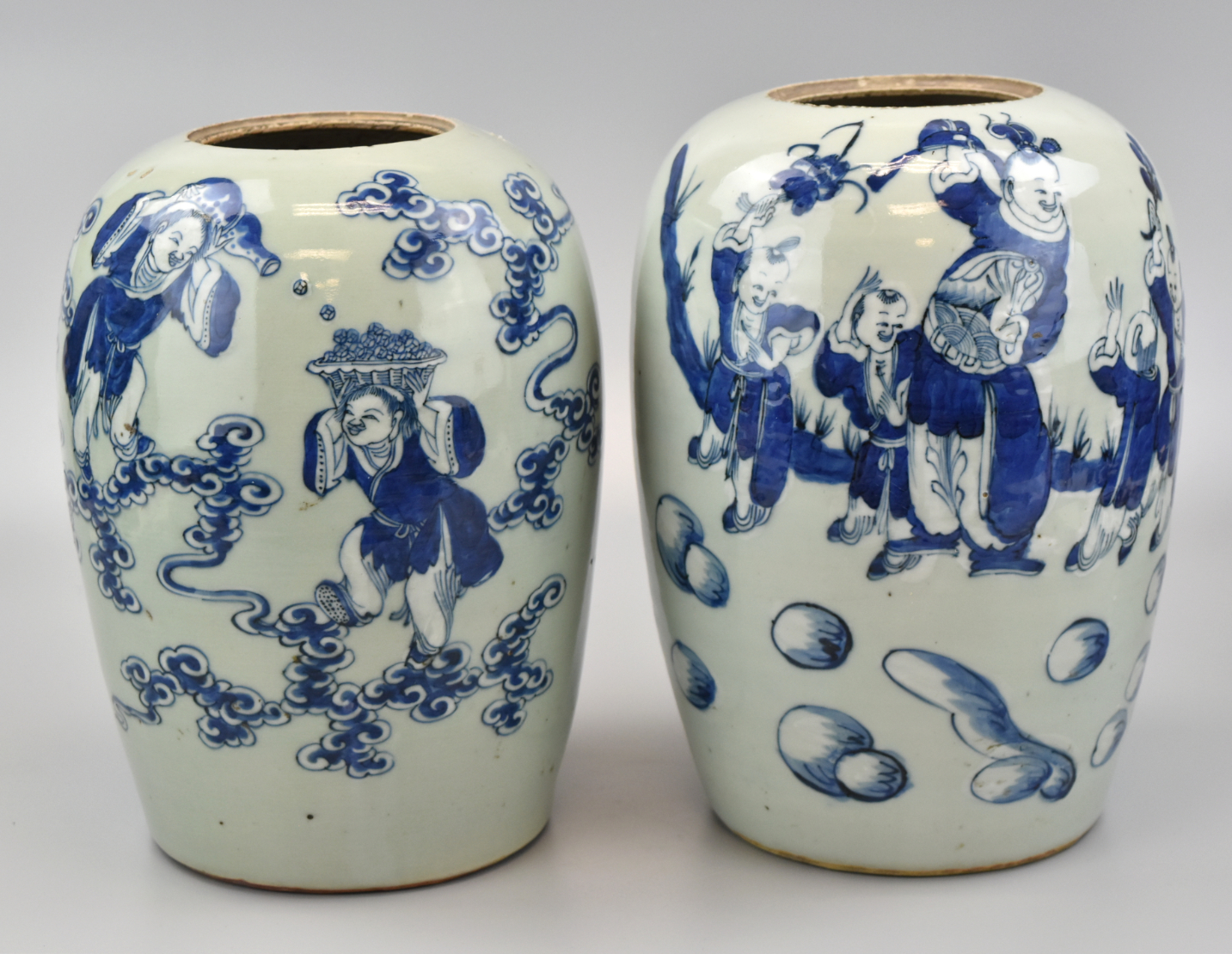 Appraisal: Two Chinese celadon glazed blue and white jars each with