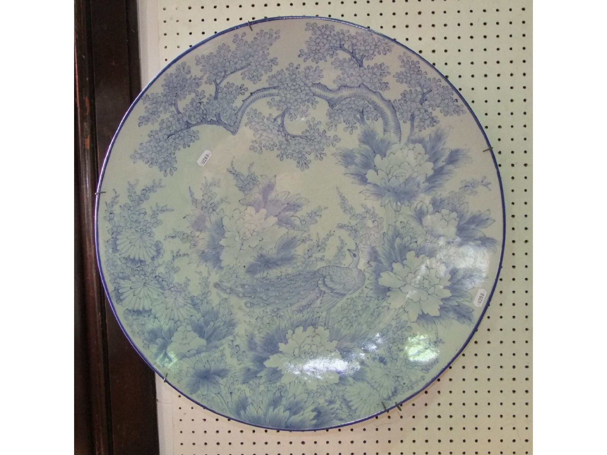 Appraisal: A large late th century oriental charger with blue and