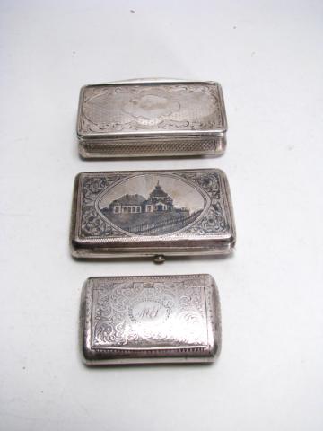 Appraisal: Group of three silver hinged-lid boxes including one Russian cigarette