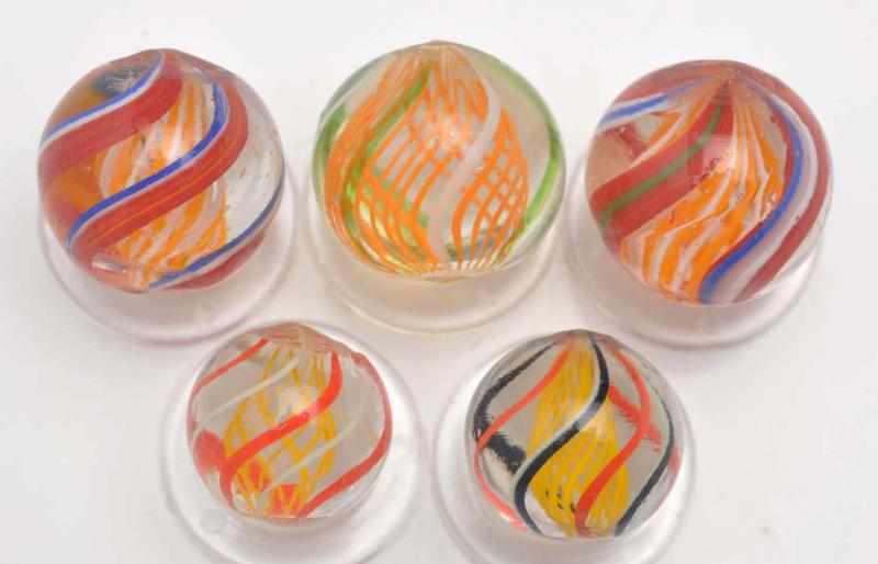 Appraisal: Lot of Latticino Swirl Marbles Description Includes two bright yellow