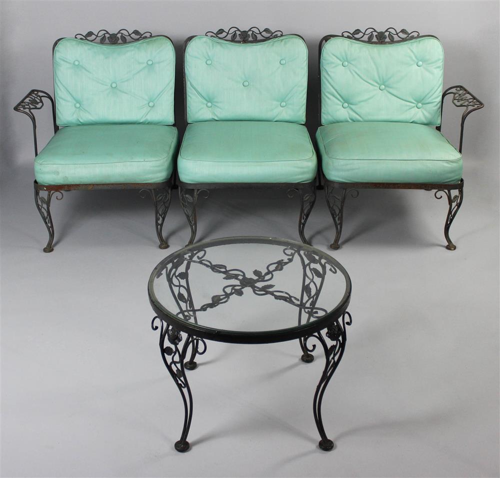 Appraisal: BLACK WROUGHT IRON GARDEN ROSE MOTIF SOFA AND SIDE TABLE