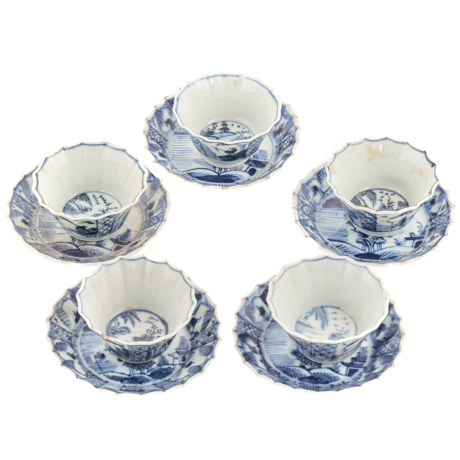 Appraisal: FIVE CHINESE EXPORT BLUE WHITE WINE CUPS SAUCERS Kang Xi