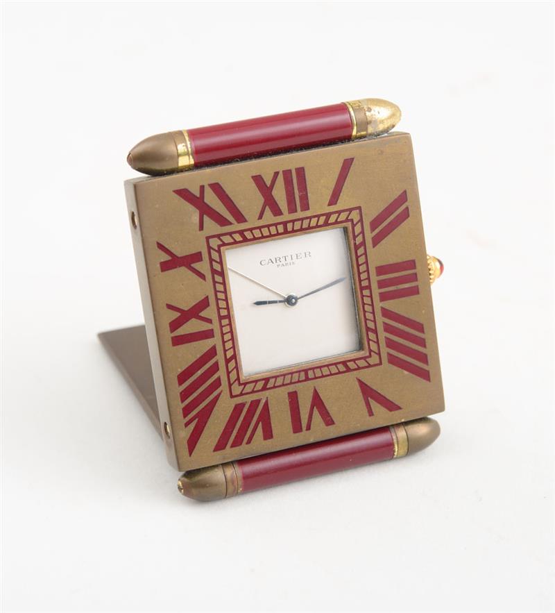 Appraisal: CARTIER BRASS AND ENAMEL TRAVEL CLOCK PARIS Fitted with a