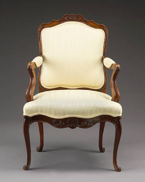 Appraisal: A Louis XV style beech fauteuil a la reine mid