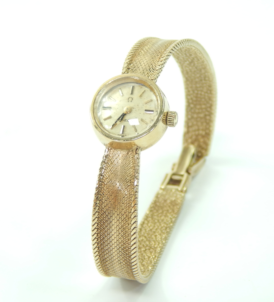 Appraisal: An Omega Lady's ct gold circular cased wristwatch champagne dial