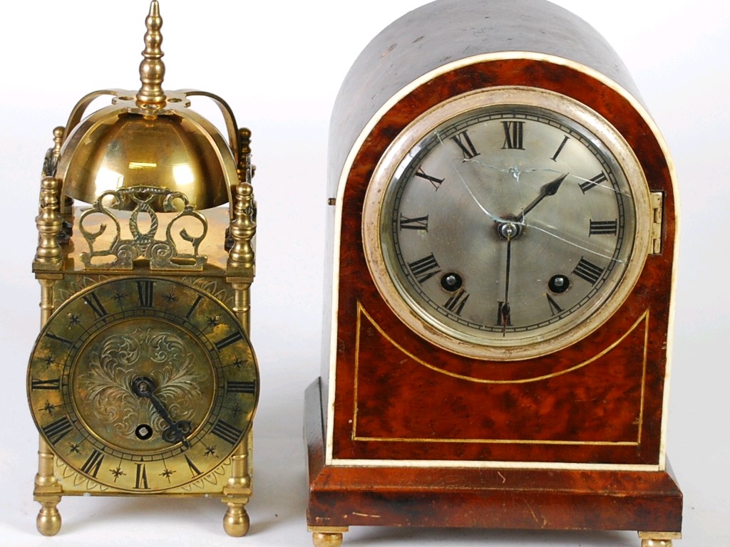 Appraisal: EARLY TWENTIETH CENTURY GERMAN HIGHLY FIGURED WALNUT MANTEL CLOCK by