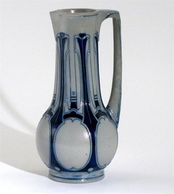 Appraisal: A Simon Gerz stoneware ewer designed by Peter Behrens model