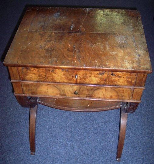 Appraisal: A Biedermeier birch veneered sewing table the hinged top concealing