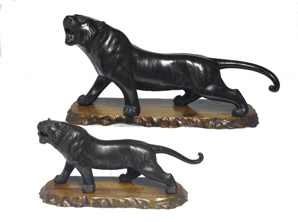 Appraisal: A BRONZE MODEL OF A ROARING TIGER the fur realistically