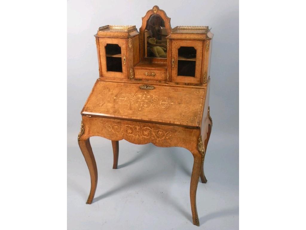 Appraisal: A Victorian figured walnut bonheur du jour with gilt metal