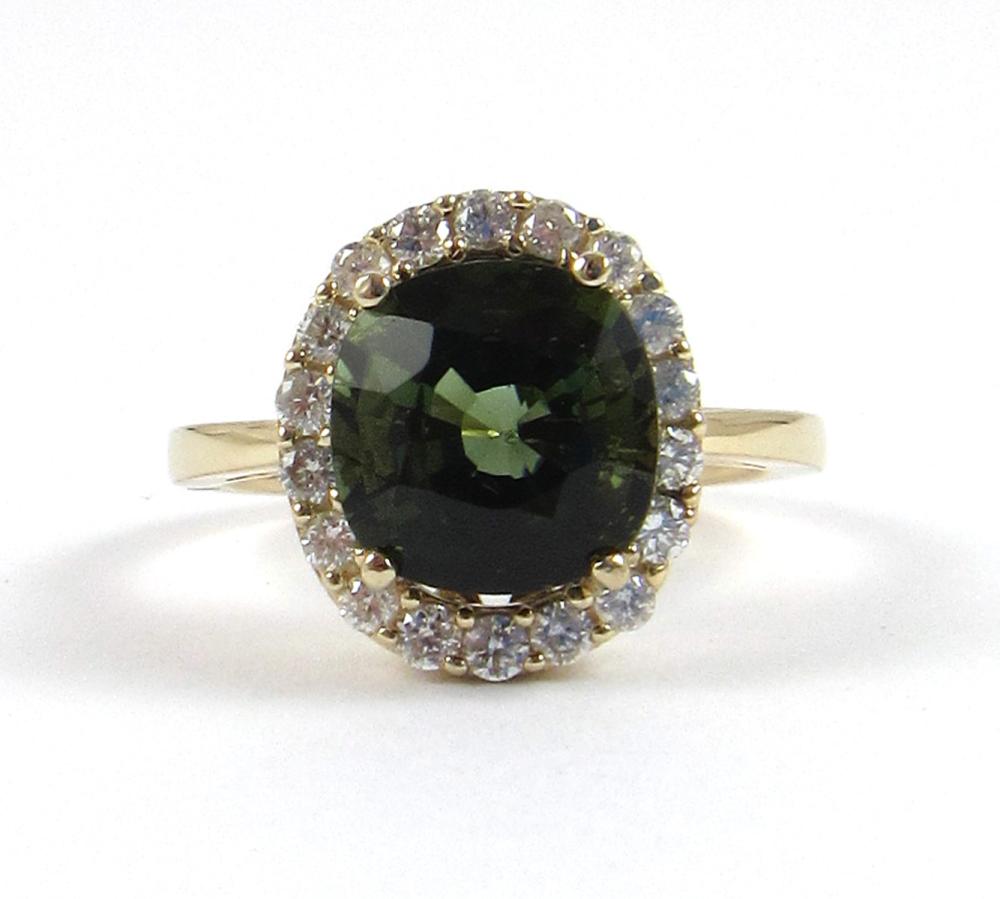 Appraisal: GREEN TOURMALINE DIAMOND AND FOURTEEN KARAT GOLD RING with round-cut