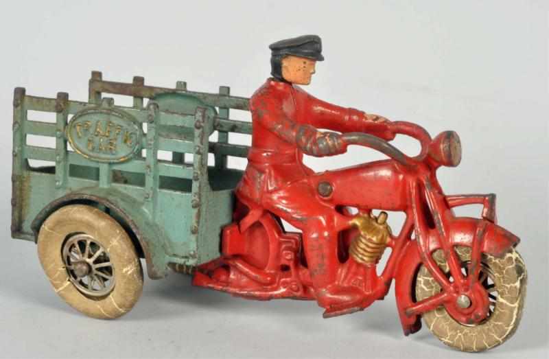 Appraisal: Cast Iron Hubley Traffic Car Motorcycle Toy American Working Medium