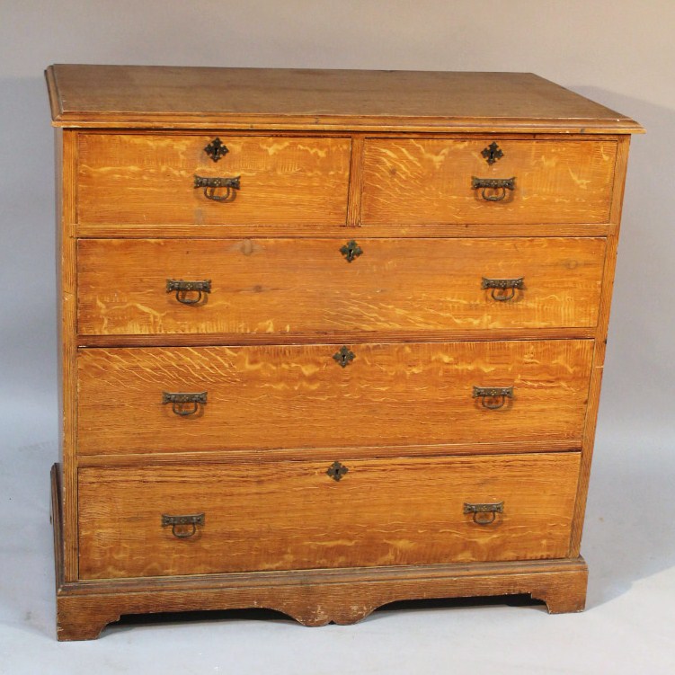 Appraisal: A thC painted pine oak effect flat front chest of