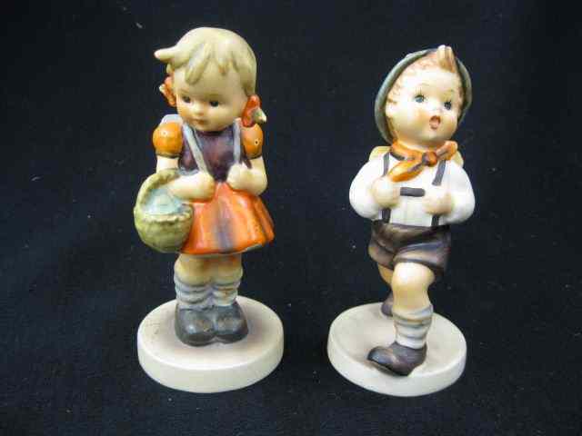 Appraisal: Hummel Figurines school boy girl '' stylized bee excellent