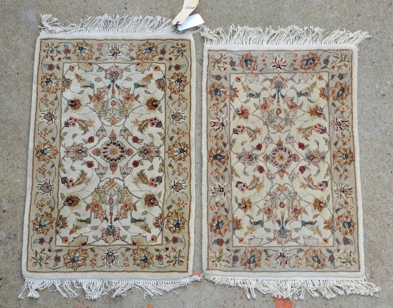 Appraisal: Beige Floral Pattern Throw Rugs X