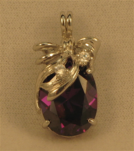 Appraisal: AMETHYST DIAMOND AND FOURTEEN KARAT WHITE GOLD PENDANT set with