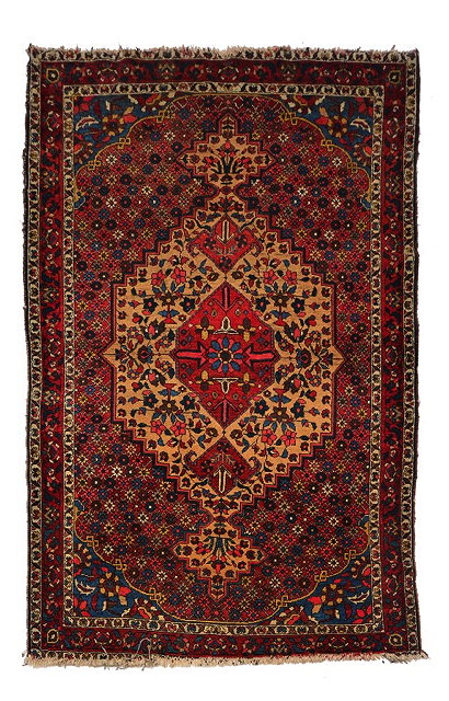 Appraisal: A HAMADAN MID RED GROUND RUG with a central camel