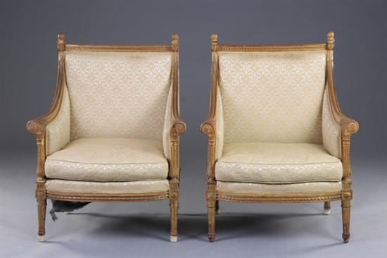 Appraisal: PAIR LOUIS XVI STYLE BERGERES th century gilt-wood Ribbon-molded surround