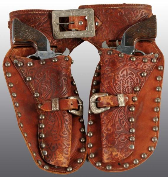 Appraisal: Roy Rogers Toy Double Holster Set Description Set includes two