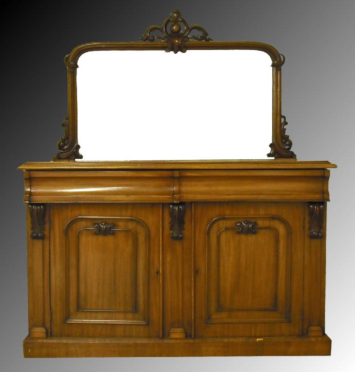 Appraisal: Victorian walnut mirror backed sideboard the rectangular mirror with a