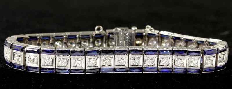 Appraisal: Diamond and Synthetic Sapphire Braceletdesigned as a flexible line bracelet