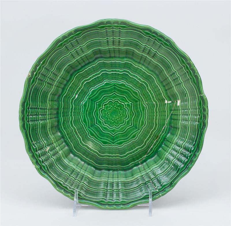 Appraisal: ENGLISH STAFFORDSHIRE GREEN-GLAZED POTTERY PLATE Broken and reglued in diam