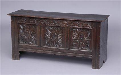 Appraisal: JACOBEAN CARVED OAK BLANKET CHEST The hinged top with thumb-cut