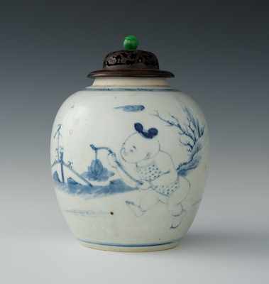 Appraisal: A Chinese Porcelain Jar With Carved Wood Lid Qianlong Hand