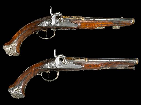 Appraisal: A composed pair of French silver-mounted percussion conversion pistols by