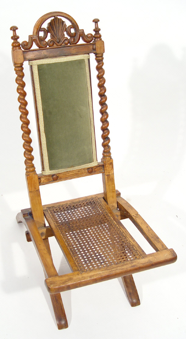 Appraisal: Victorian folding walnut chair with turned supports and green upholstery