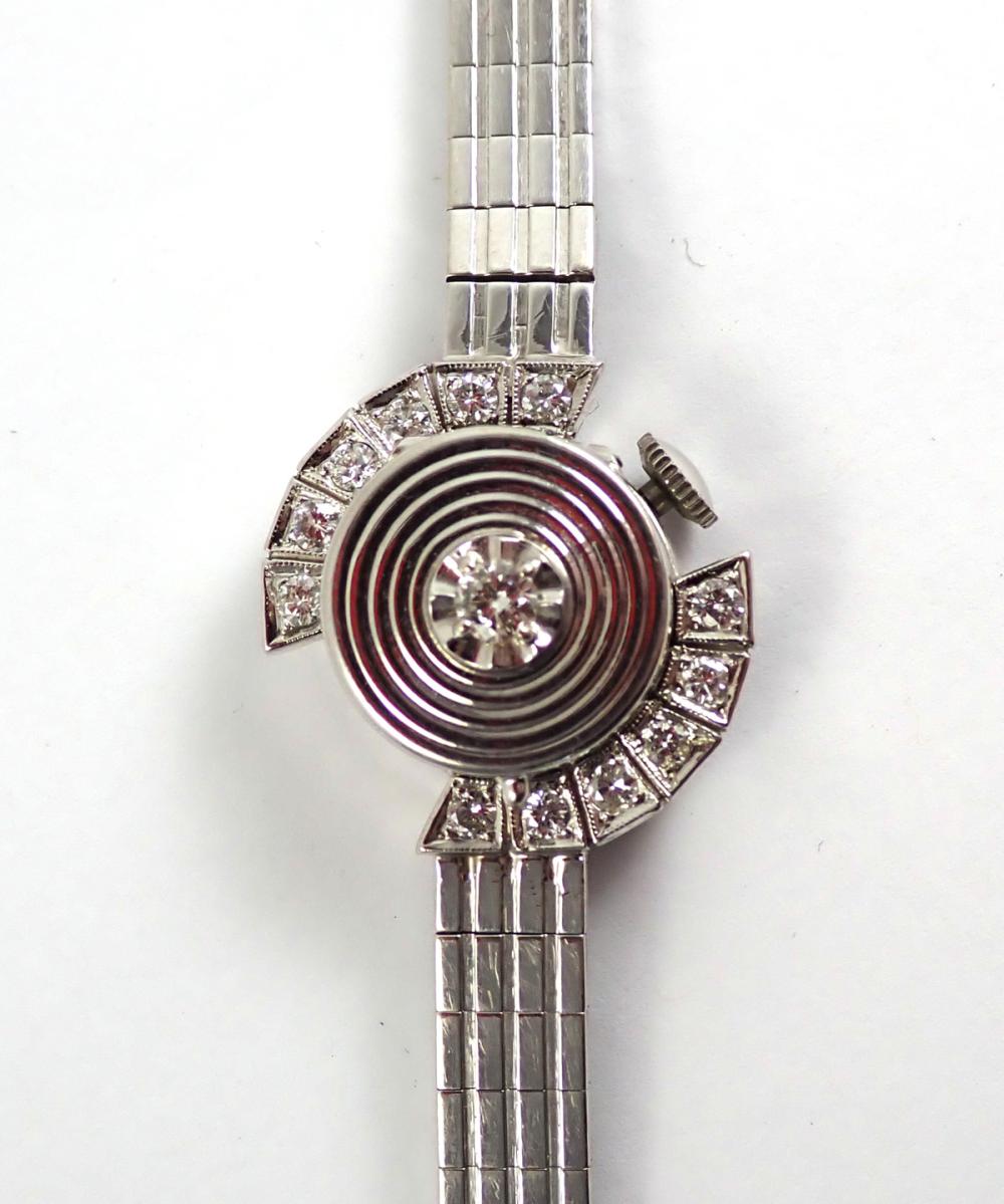 Appraisal: LADY'S DIAMOND AND FOURTEEN KARAT WHITE GOLD WRIST WATCH integral