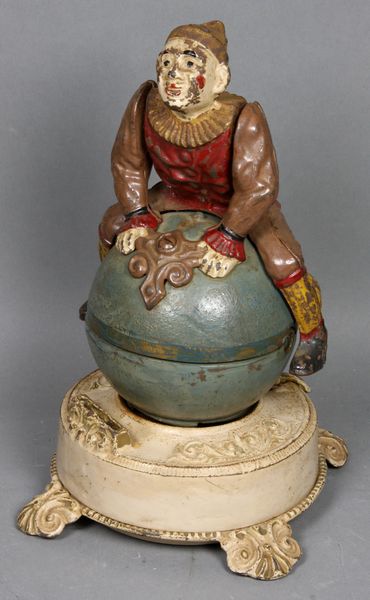 Appraisal: Circa cast iron mechanical bank Clown on Globe by J