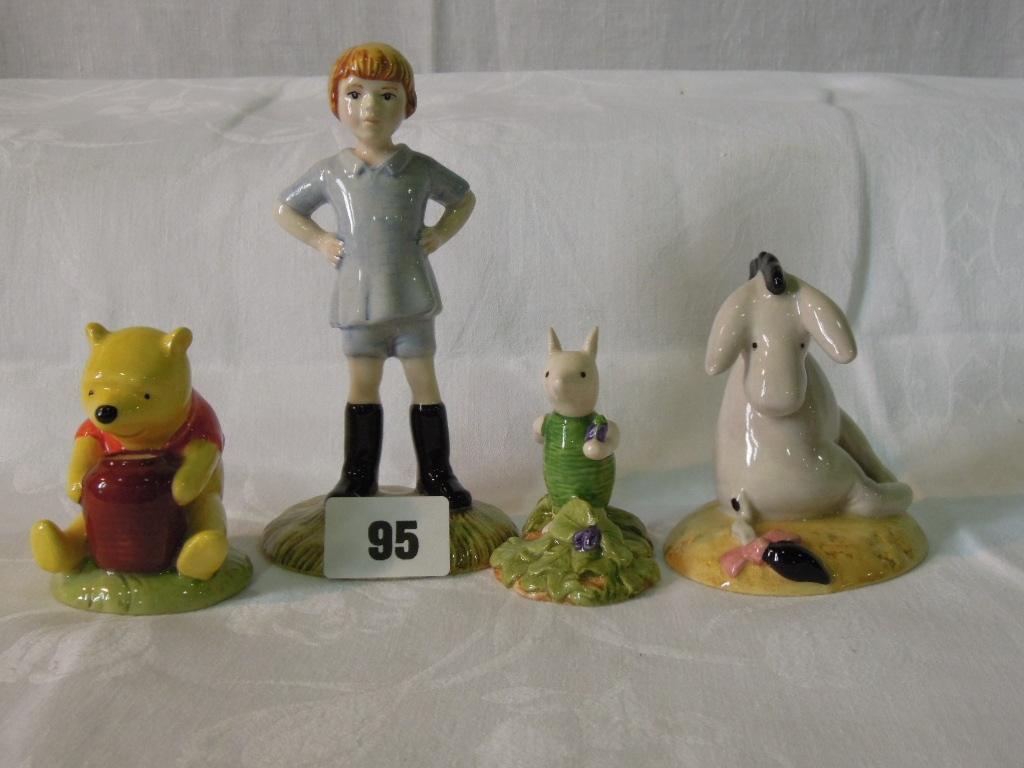 Appraisal: A collection of four Royal Doulton figures from the Winnie