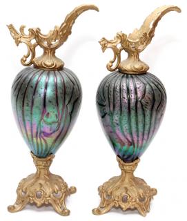 Appraisal: ART GLASS AND METAL EWERS C PAIR ART GLASS AND