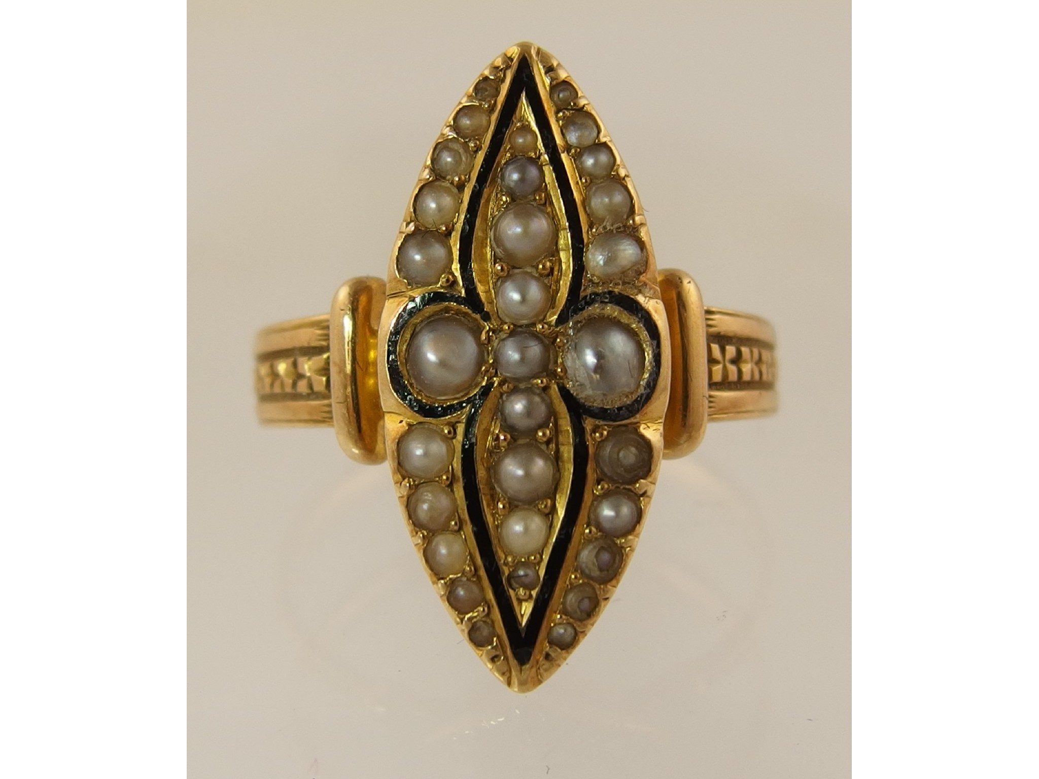 Appraisal: A Victorian mourning ringset with split pearls and a fine