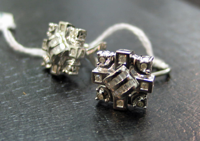 Appraisal: PAIR OF DIAMOND AND FOURTEEN KARAT WHITE GOLD EARRINGS each