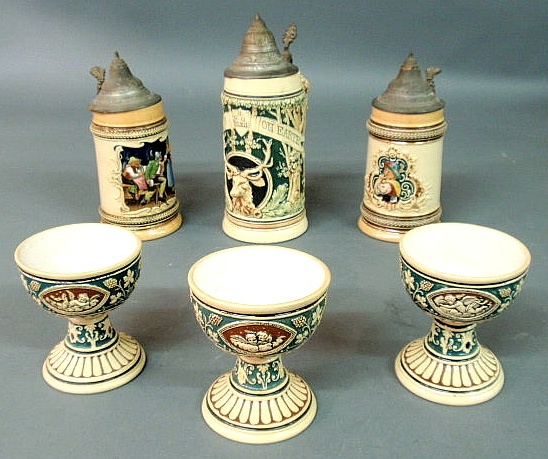 Appraisal: Three Mettlach cups two h one h two liter steins