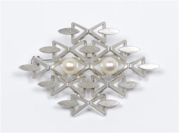 Appraisal: GOLD AND PEARL BROOCH White gold g Decorative lozenge-shaped brooch