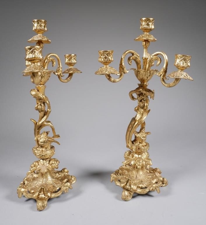 Appraisal: French gilt metal four-light candelabra pair in the form of