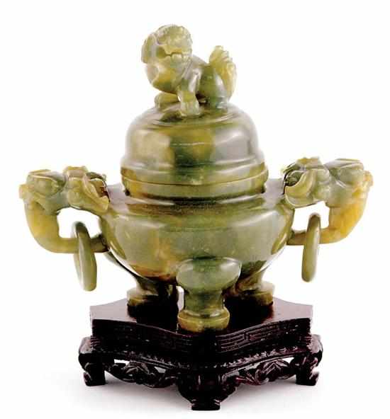 Appraisal: Chinese carved jade covered urn late Qing Dynasty shishi finial