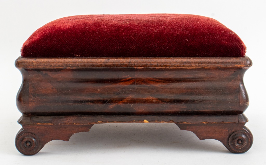 Appraisal: VICTORIAN STYLE MAHOGANY UPHOLSTERED FOOTREST Victorian style carved mahogany footrest