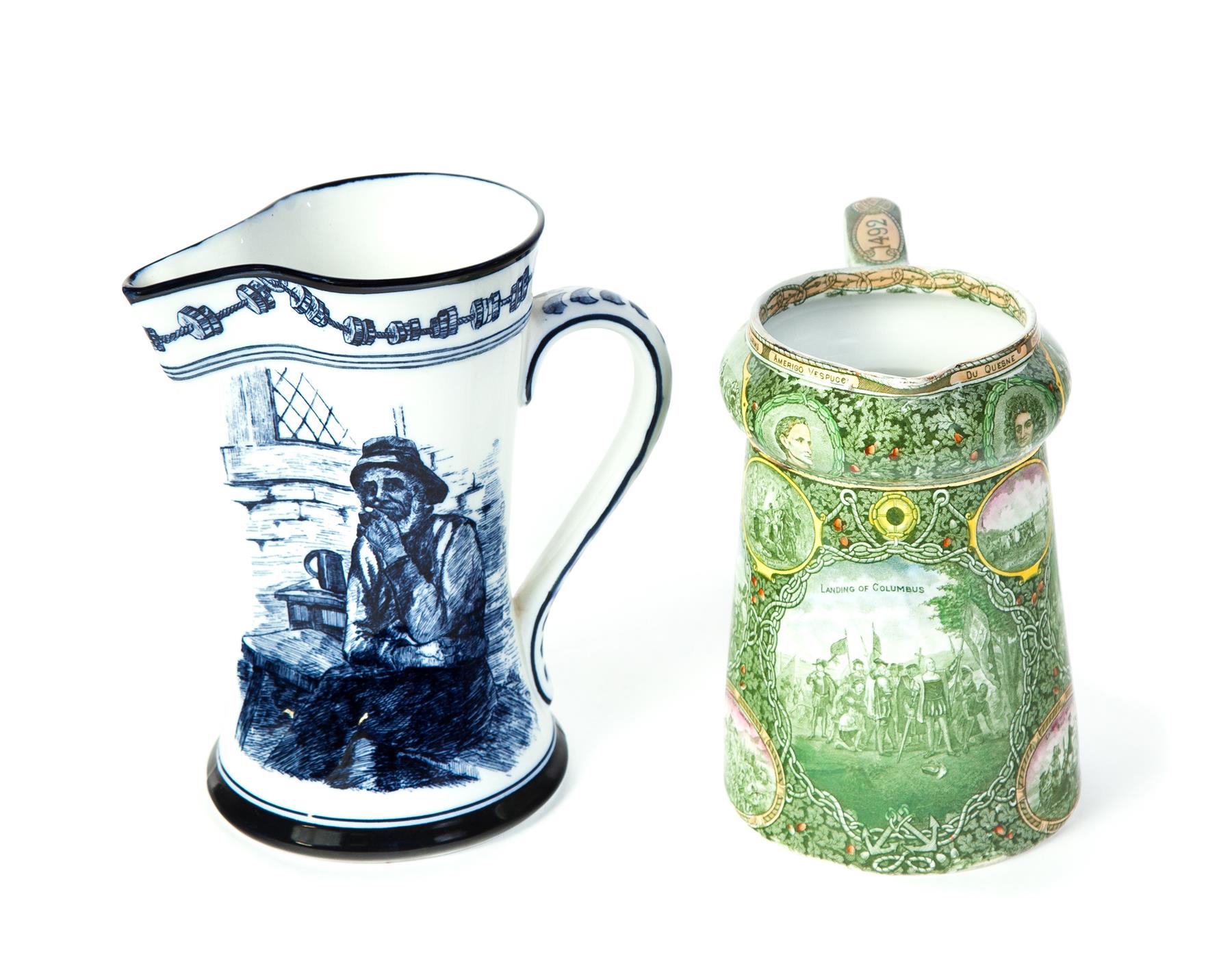 Appraisal: TWO ENGLISH SCENIC PITCHERS Ca Blue and white with old