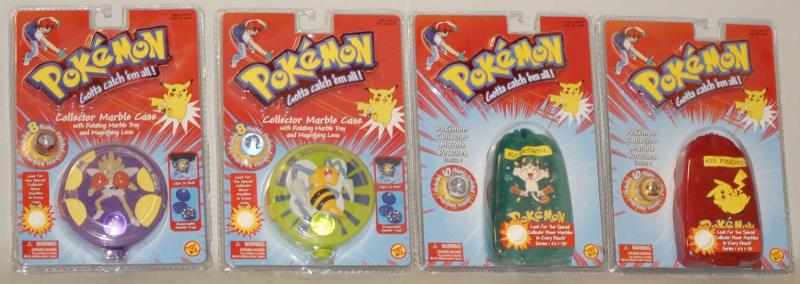 Appraisal: Lot of Pokemon Toys in Boxes Includes three gold plated